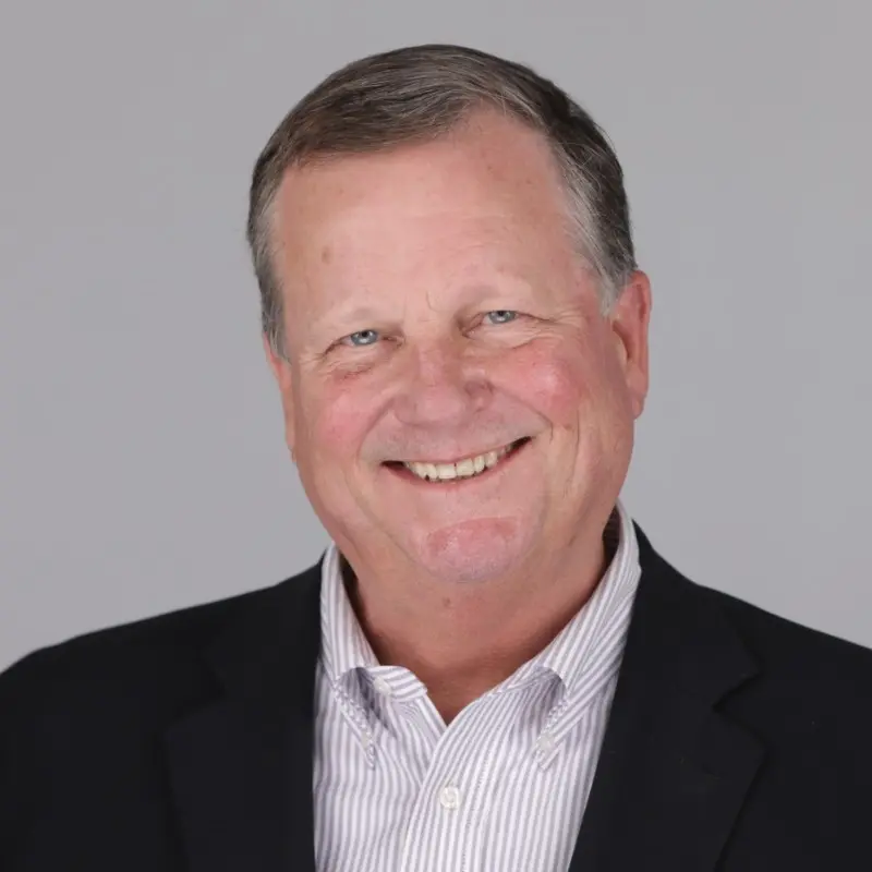 Professional headshot of a satisfied customer providing a testimonial.